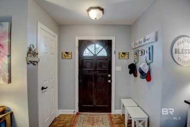 Full of southern charm, this beautiful 3-bedroom, 2-bath cottage on Lake Forest Yacht and Country Club in Alabama - for sale on GolfHomes.com, golf home, golf lot