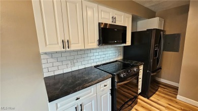Welcome to easy, stylish living in the highly sought-after on Mayfair Country Club in Ohio - for sale on GolfHomes.com, golf home, golf lot