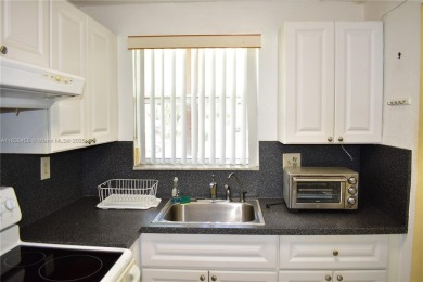 This is a well located ground floor unit with all tile floors, a on  in Florida - for sale on GolfHomes.com, golf home, golf lot