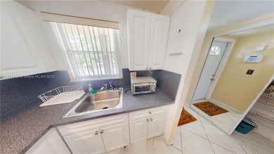 This is a well located ground floor unit with all tile floors, a on  in Florida - for sale on GolfHomes.com, golf home, golf lot