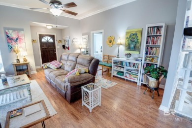 Full of southern charm, this beautiful 3-bedroom, 2-bath cottage on Lake Forest Yacht and Country Club in Alabama - for sale on GolfHomes.com, golf home, golf lot