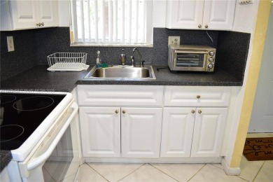 This is a well located ground floor unit with all tile floors, a on  in Florida - for sale on GolfHomes.com, golf home, golf lot