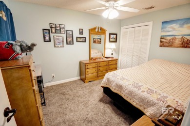 Full of southern charm, this beautiful 3-bedroom, 2-bath cottage on Lake Forest Yacht and Country Club in Alabama - for sale on GolfHomes.com, golf home, golf lot