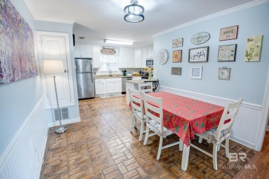 Full of southern charm, this beautiful 3-bedroom, 2-bath cottage on Lake Forest Yacht and Country Club in Alabama - for sale on GolfHomes.com, golf home, golf lot