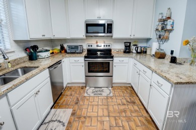 Full of southern charm, this beautiful 3-bedroom, 2-bath cottage on Lake Forest Yacht and Country Club in Alabama - for sale on GolfHomes.com, golf home, golf lot