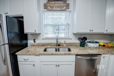 Full of southern charm, this beautiful 3-bedroom, 2-bath cottage on Lake Forest Yacht and Country Club in Alabama - for sale on GolfHomes.com, golf home, golf lot