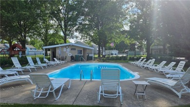 Welcome to easy, stylish living in the highly sought-after on Mayfair Country Club in Ohio - for sale on GolfHomes.com, golf home, golf lot