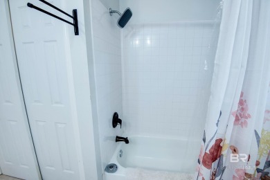 Full of southern charm, this beautiful 3-bedroom, 2-bath cottage on Lake Forest Yacht and Country Club in Alabama - for sale on GolfHomes.com, golf home, golf lot