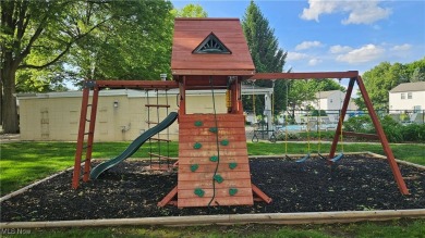Welcome to easy, stylish living in the highly sought-after on Mayfair Country Club in Ohio - for sale on GolfHomes.com, golf home, golf lot