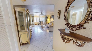 This is a well located ground floor unit with all tile floors, a on Sunrise Lakes Phase III in Florida - for sale on GolfHomes.com, golf home, golf lot