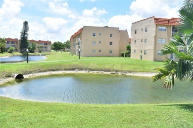This is a well located ground floor unit with all tile floors, a on Sunrise Lakes Phase III in Florida - for sale on GolfHomes.com, golf home, golf lot