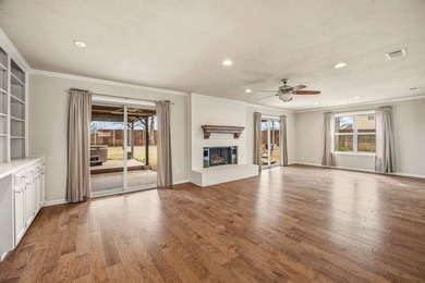 Step into this beautifully updated 3-bedroom, 2-bath home, where on Pecan Plantation Country Club in Texas - for sale on GolfHomes.com, golf home, golf lot