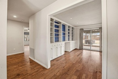 Step into this beautifully updated 3-bedroom, 2-bath home, where on Pecan Plantation Country Club in Texas - for sale on GolfHomes.com, golf home, golf lot