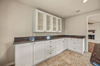 Step into this beautifully updated 3-bedroom, 2-bath home, where on Pecan Plantation Country Club in Texas - for sale on GolfHomes.com, golf home, golf lot