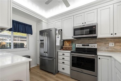 Step into refined living in this beautifully updated first-floor on Golfview Golf and Racquet Club in Florida - for sale on GolfHomes.com, golf home, golf lot