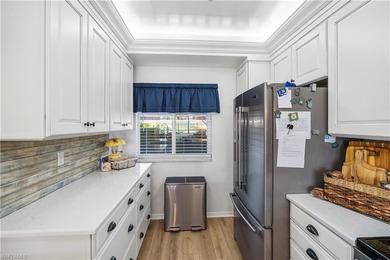 Step into refined living in this beautifully updated first-floor on Golfview Golf and Racquet Club in Florida - for sale on GolfHomes.com, golf home, golf lot