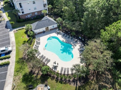 Don't hesitate to view this amazing top-floor end unit, it is on Barefoot Resort and Golf Club  in South Carolina - for sale on GolfHomes.com, golf home, golf lot