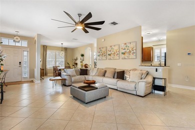 Charming modern Southern-style two-story home with double front on Harmony Golf Preserve in Florida - for sale on GolfHomes.com, golf home, golf lot