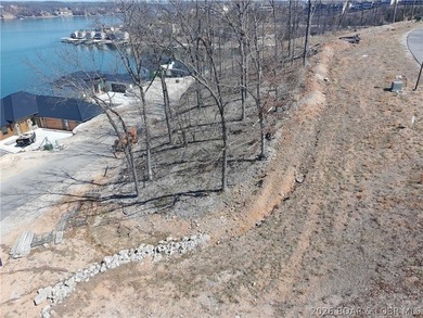 Lot 18 is now ready for you to build your dream home at one of on Seasons Ridge At Four Seasons in Missouri - for sale on GolfHomes.com, golf home, golf lot