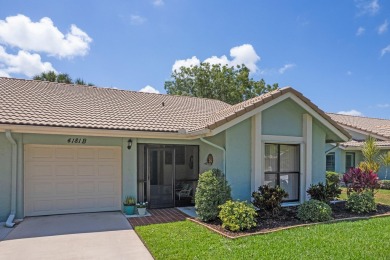 Enjoy Easy Living in this Chic Contemporary-Style Villa with on Gator Trace Golf and Country Club in Florida - for sale on GolfHomes.com, golf home, golf lot