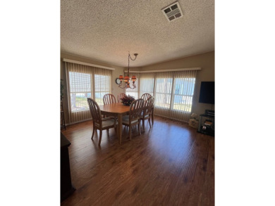 Welcome to this beautifully maintained two-bedroom, two-bath on Pine Lakes Country Club in Florida - for sale on GolfHomes.com, golf home, golf lot