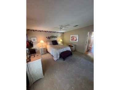 Welcome to this beautifully maintained two-bedroom, two-bath on Pine Lakes Country Club in Florida - for sale on GolfHomes.com, golf home, golf lot