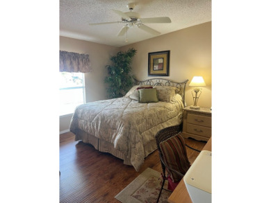 Welcome to this beautifully maintained two-bedroom, two-bath on Pine Lakes Country Club in Florida - for sale on GolfHomes.com, golf home, golf lot