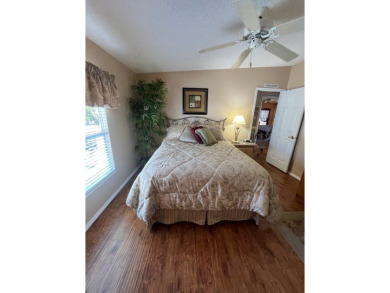 Welcome to this beautifully maintained two-bedroom, two-bath on Pine Lakes Country Club in Florida - for sale on GolfHomes.com, golf home, golf lot