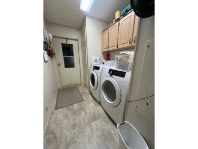 Welcome to this beautifully maintained two-bedroom, two-bath on Pine Lakes Country Club in Florida - for sale on GolfHomes.com, golf home, golf lot