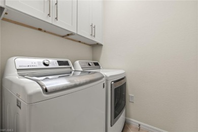 Come experience this gorgeous Coach home in the resort lifestyle on Gateway Golf and Country Club in Florida - for sale on GolfHomes.com, golf home, golf lot