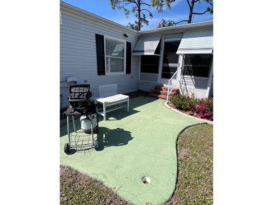 Welcome to this beautifully maintained two-bedroom, two-bath on Pine Lakes Country Club in Florida - for sale on GolfHomes.com, golf home, golf lot