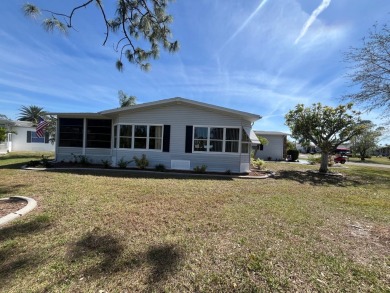 Welcome to this beautifully maintained two-bedroom, two-bath on Pine Lakes Country Club in Florida - for sale on GolfHomes.com, golf home, golf lot