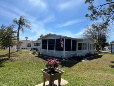 Welcome to this beautifully maintained two-bedroom, two-bath on Pine Lakes Country Club in Florida - for sale on GolfHomes.com, golf home, golf lot