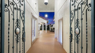 Welcome to a one-of-a-kind Mediterranean masterpiece tucked on Wedgefield Golf Club in Florida - for sale on GolfHomes.com, golf home, golf lot