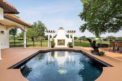 Welcome to a one-of-a-kind Mediterranean masterpiece tucked on Wedgefield Golf Club in Florida - for sale on GolfHomes.com, golf home, golf lot