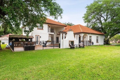 Welcome to a one-of-a-kind Mediterranean masterpiece tucked on Wedgefield Golf Club in Florida - for sale on GolfHomes.com, golf home, golf lot