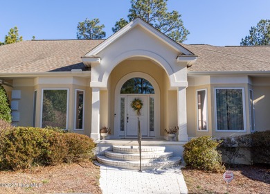 Enjoy elegant golf course living at its best in this impressive on Pinewild Country Club of Pinehurst in North Carolina - for sale on GolfHomes.com, golf home, golf lot