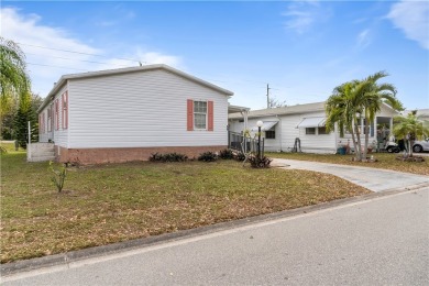 This charming home has been meticulously maintained, showcasing on Barefoot Bay Golf Course in Florida - for sale on GolfHomes.com, golf home, golf lot