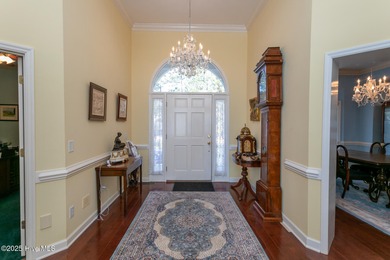 Enjoy elegant golf course living at its best in this impressive on Pinewild Country Club of Pinehurst in North Carolina - for sale on GolfHomes.com, golf home, golf lot