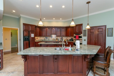 Enjoy elegant golf course living at its best in this impressive on Pinewild Country Club of Pinehurst in North Carolina - for sale on GolfHomes.com, golf home, golf lot