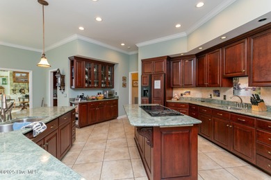 Enjoy elegant golf course living at its best in this impressive on Pinewild Country Club of Pinehurst in North Carolina - for sale on GolfHomes.com, golf home, golf lot