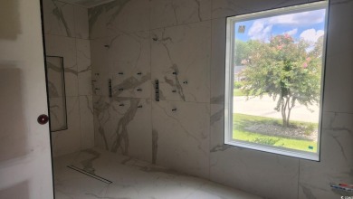 Welcome to this stunning new construction home in the on Wild Wing Plantation in South Carolina - for sale on GolfHomes.com, golf home, golf lot