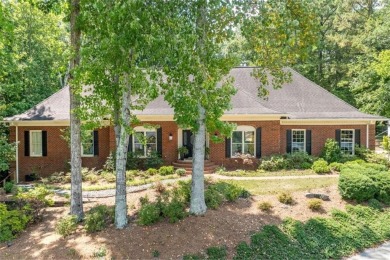 Welcome to this gorgeous three-sided brick European style ranch on Brookfield Country Club in Georgia - for sale on GolfHomes.com, golf home, golf lot