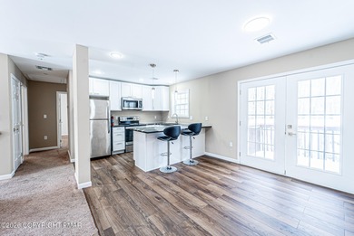 CHARMING UPGRADED BRIARCLIFF TERRACE POCONOS LAKE BI-LEVEL HOME on Pocono Farms Country Club in Pennsylvania - for sale on GolfHomes.com, golf home, golf lot