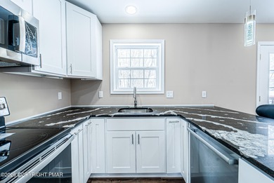 CHARMING UPGRADED BRIARCLIFF TERRACE POCONOS LAKE BI-LEVEL HOME on Pocono Farms Country Club in Pennsylvania - for sale on GolfHomes.com, golf home, golf lot