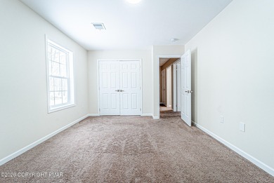 CHARMING UPGRADED BRIARCLIFF TERRACE POCONOS LAKE BI-LEVEL HOME on Pocono Farms Country Club in Pennsylvania - for sale on GolfHomes.com, golf home, golf lot