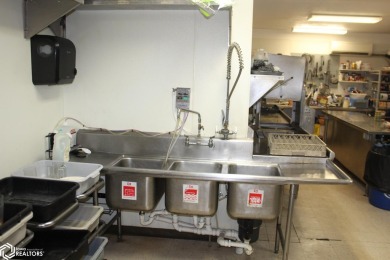 ?? Exciting Investment Prospect! ??Step into a premier dining on Belmond Country Club in Iowa - for sale on GolfHomes.com, golf home, golf lot