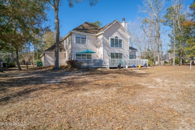 Welcome to this delightful 3-bedroom, 2.5-bathroom gem nestled on Diamondhead Country Club in Mississippi - for sale on GolfHomes.com, golf home, golf lot