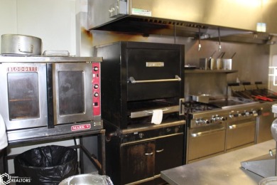 ?? Exciting Investment Prospect! ??Step into a premier dining on Belmond Country Club in Iowa - for sale on GolfHomes.com, golf home, golf lot
