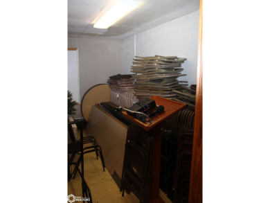 Exciting Investment Prospect!  Step into a premier dining on Belmond Country Club in Iowa - for sale on GolfHomes.com, golf home, golf lot